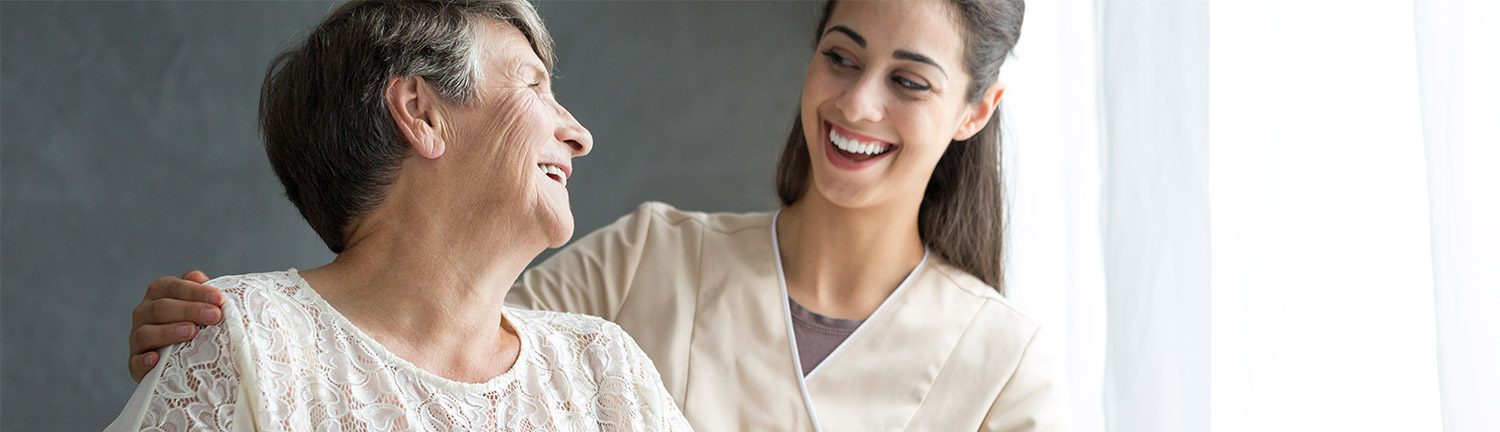 nurse and patient smiling Universal Home Health Care Inc. in Eastern, WI